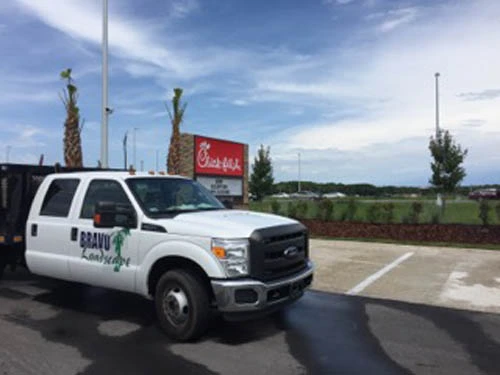Commercial lawn maintenance at Chick-fil-A.